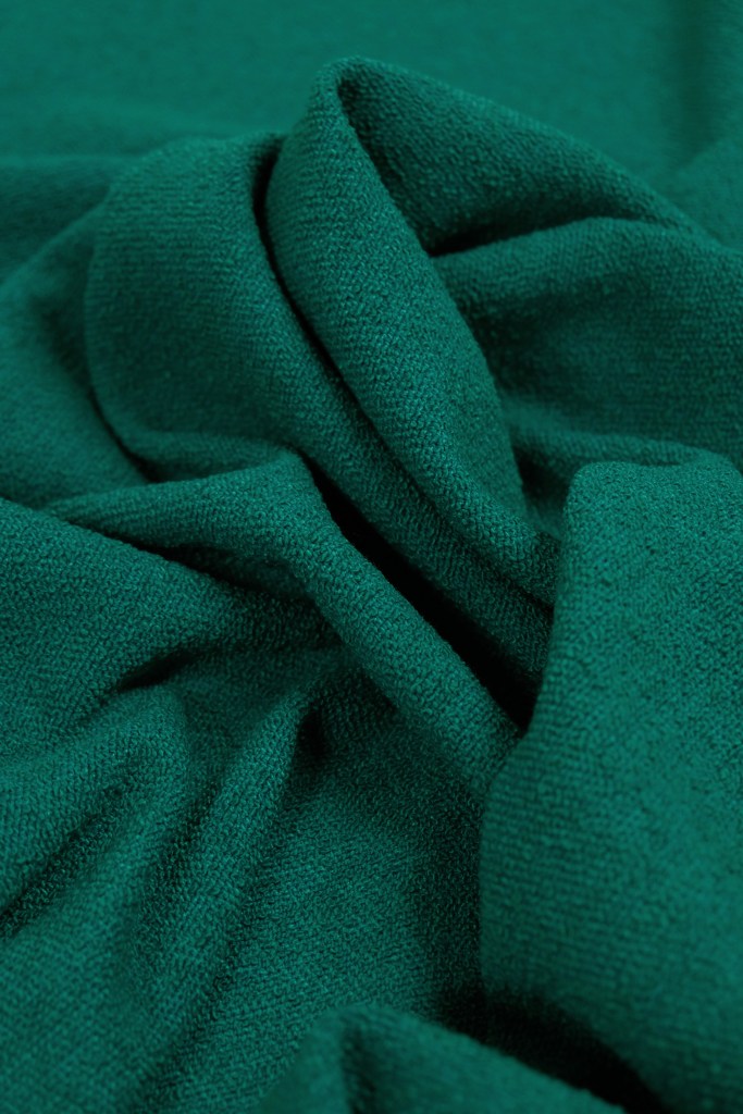 Green distressed fabric and textile